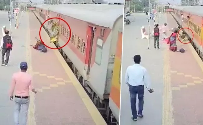 West Bengal: RPF Officer Saves Woman From Crushing Under Train Purulia Station - Sakshi