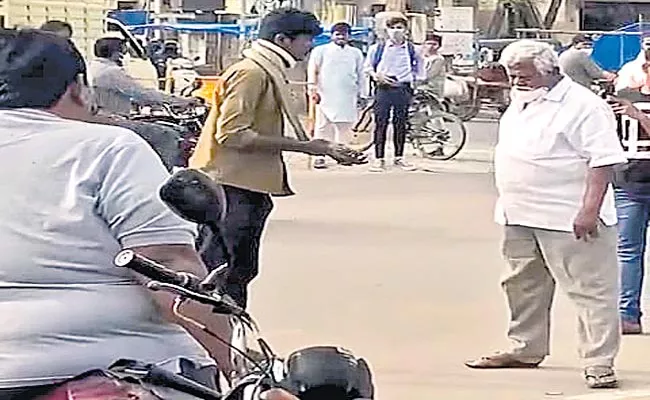 Begging With Snake Around The Neck In Ramachandrapuram - Sakshi