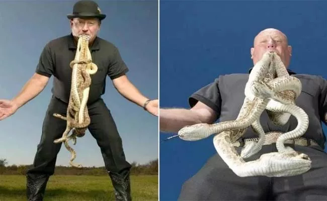 Man Pressed 11 Dangerous Poisonous Snakes In His Mouth Worlds Dangerous Stunt - Sakshi