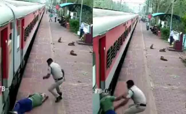 Karnataka: Railway Police Saves Life Of Elderly - Sakshi