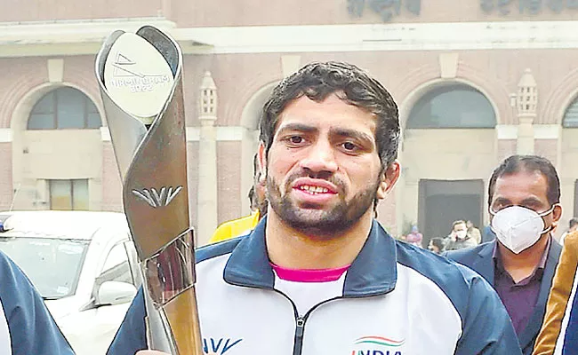 Ravi Kumar Dahiya Starts Queens Baton Relay In India - Sakshi