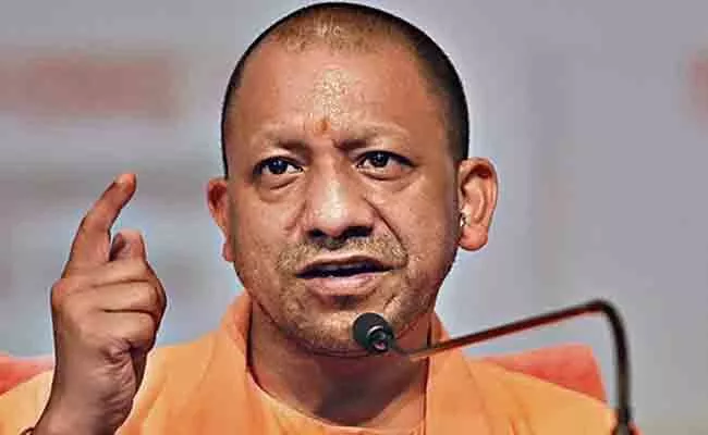 CM Yogi Adityanath May Contest From Ayodhya UP Assembly Election - Sakshi