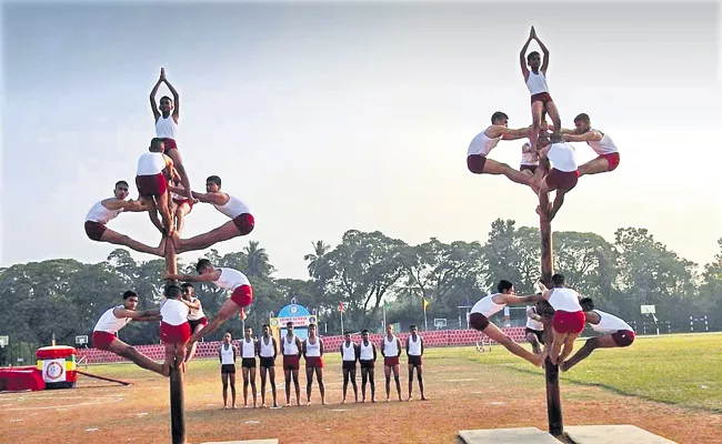 Military school anniversary celebration with Student stunts - Sakshi