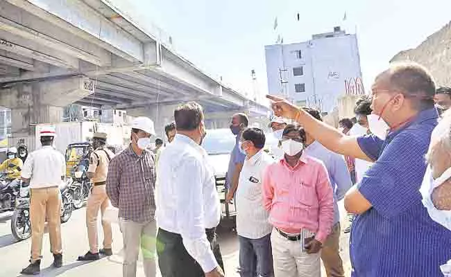 Flyover And Underpass Works Undergoing In Hyderabad Patabasti - Sakshi