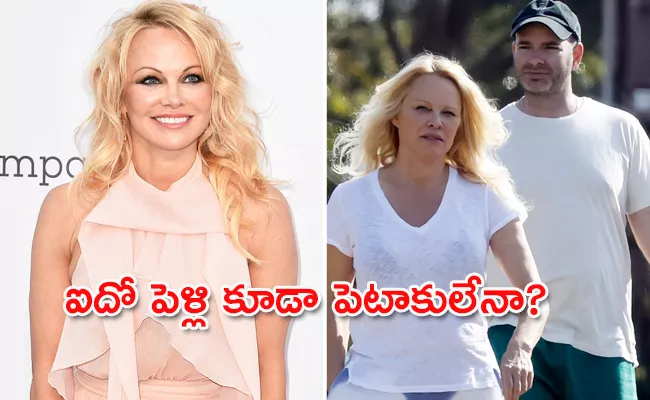 Pamela Anderson Files Divorce With Her 5th Husband Dan Hayhurst, Deets Inside - Sakshi