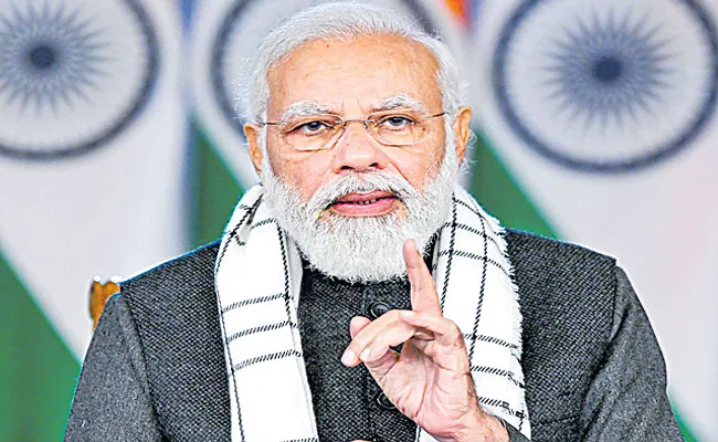 PM Narendra Modi asks districts to set time-bound targets for govt  - Sakshi