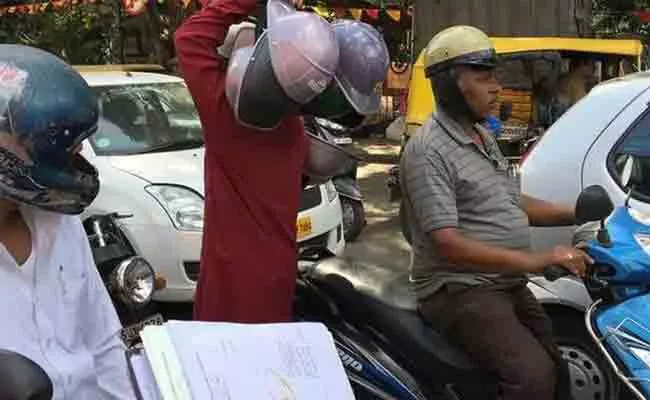 People Wearing Helmet Without ISI Mark Will Be Fined In Bengaluru - Sakshi