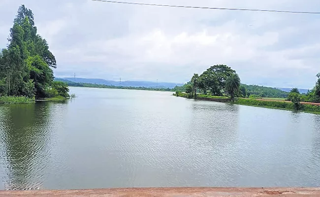 Ponds were filled in Andhra Pradesh With Rains Happiness In Farmers - Sakshi