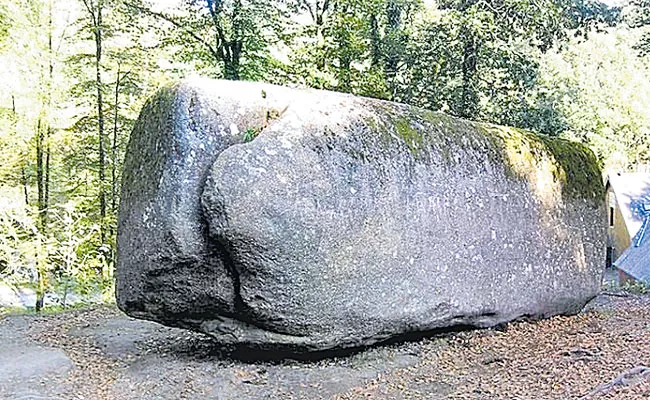 Shocking: Huelgoat Forest Rock Can Be Moved By Human France - Sakshi