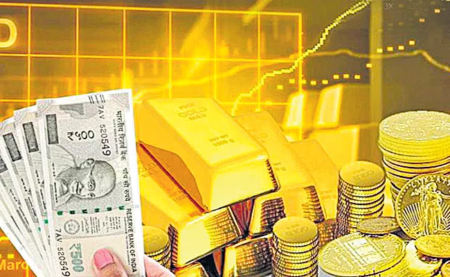 Gold ETFs attract Rs 4,814-cr in 2021 on firming inflation - Sakshi