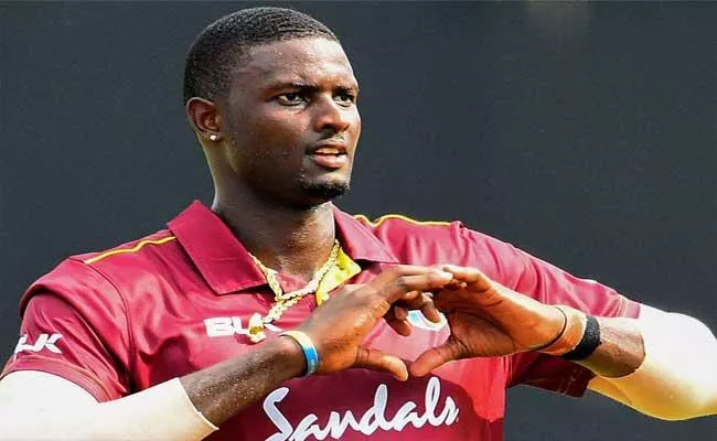 RCB to break the bank to rope in Jason Holder in IPL mega auction Says Reports - Sakshi