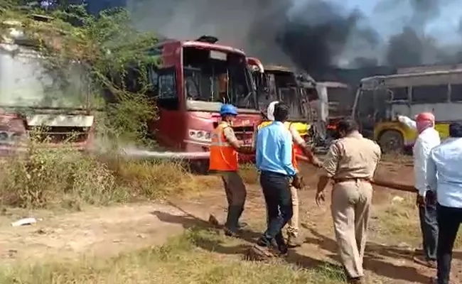 Private Buses catch Fire In Prakasam District - Sakshi