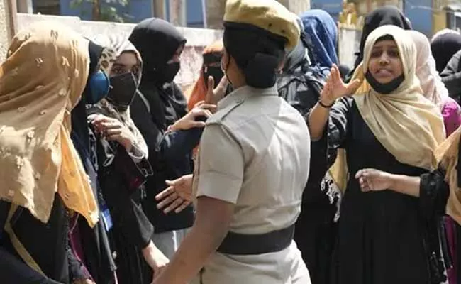 Karnataka High Court To Pronounce Hijab Row Judgement Tomorrow - Sakshi