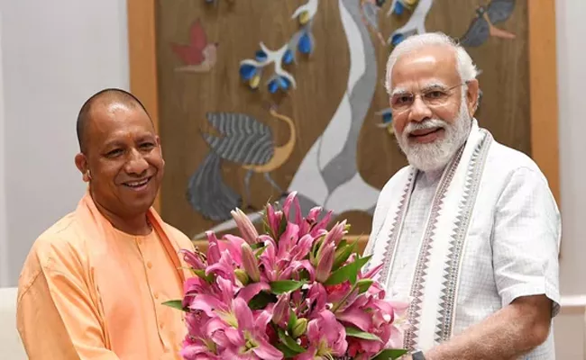 Uttar Pradesh CM Yogi Adityanath meets PM Narendra Modi in Delhi - Sakshi