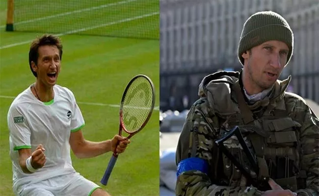 Roger Federers Ukrainian Conqueror Sergiy Stakhovsky Swaps Racquet For Kalashnikov - Sakshi