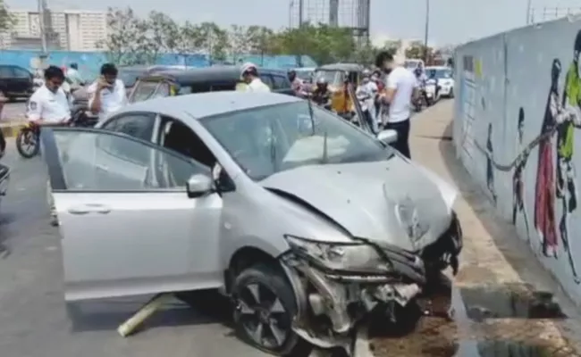 Car Accident At Khairatabad Flyover Hyderabad - Sakshi