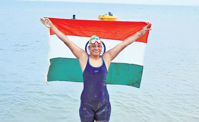 A 47-year-old Telugu woman swimming in oceans - Sakshi