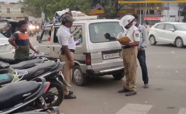 Bengaluru: Traffic Police Over Action While Checking Andhra Pradesh Vehicles - Sakshi