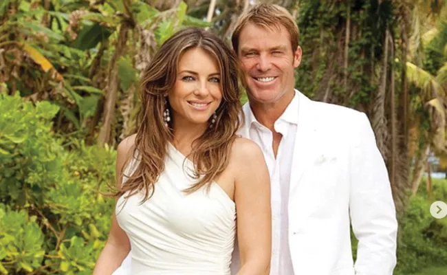 Actress Liz Hurley Emotional Note On Unable to Attend Shane Warne Funeral - Sakshi