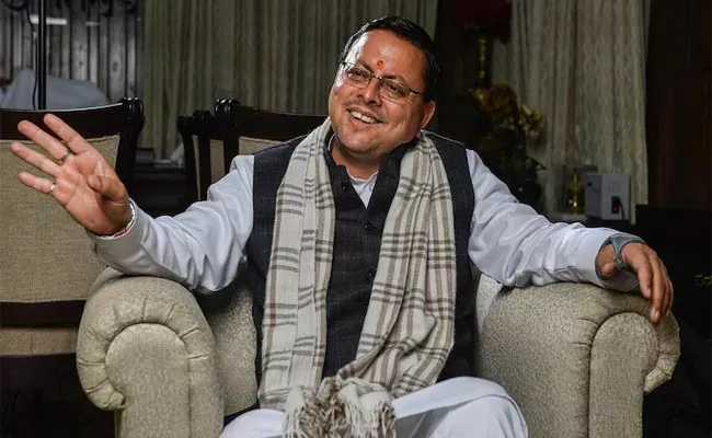 Pushkar Singh Dhami Will Continue As Uttarakhand CM - Sakshi