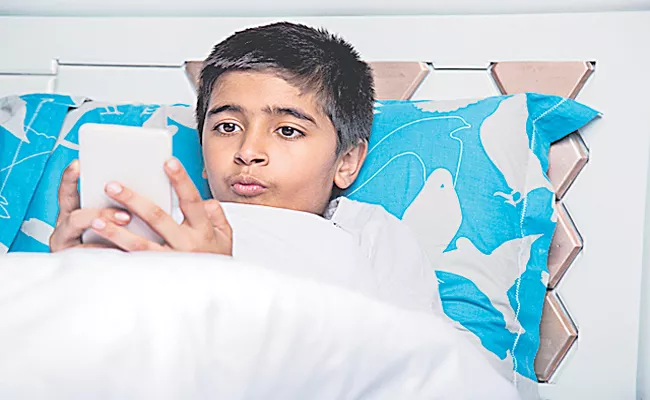 23. 80 per cent of children use smart phones while they are in bed - Sakshi