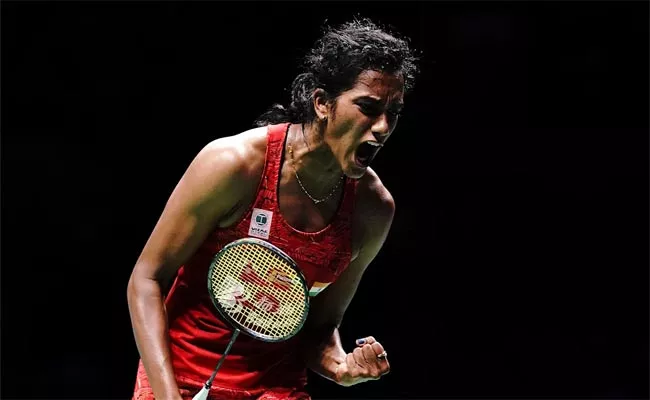 PV Sindhu storm into Semi finals In Swiss Open badminton - Sakshi