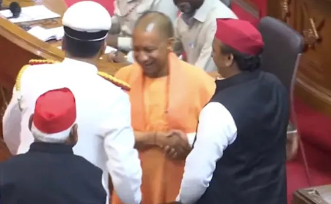 Rare Moment of CM Adityanath, Akhilesh Yadav Smiling, Shaking Hands in UP Assembly - Sakshi