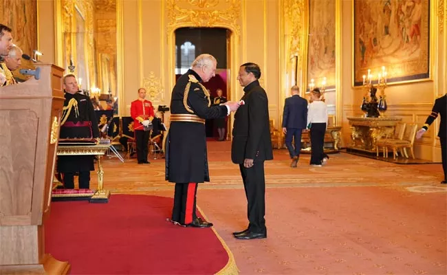 Dr P Raghuram Received The British Empire OBE Award - Sakshi