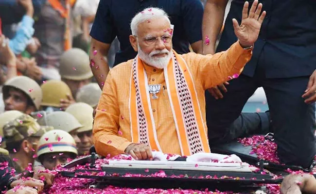 PM Modi Election Rally In Varanasi - Sakshi