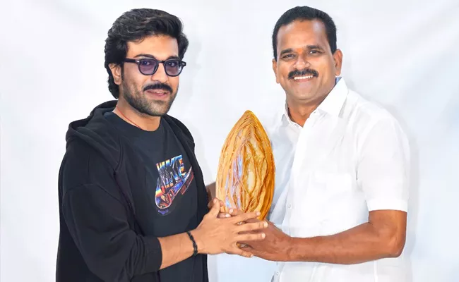 Ram Charan Honored With Bahubali Kaja - Sakshi