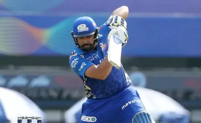 MI skipper Rohit Sharma fined INR 24 lakh for second slow over rate Against Punjab Kings - Sakshi