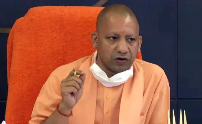 Stay at Guesthouses, not Hotels: UP CM Adityanath Tells Ministers - Sakshi