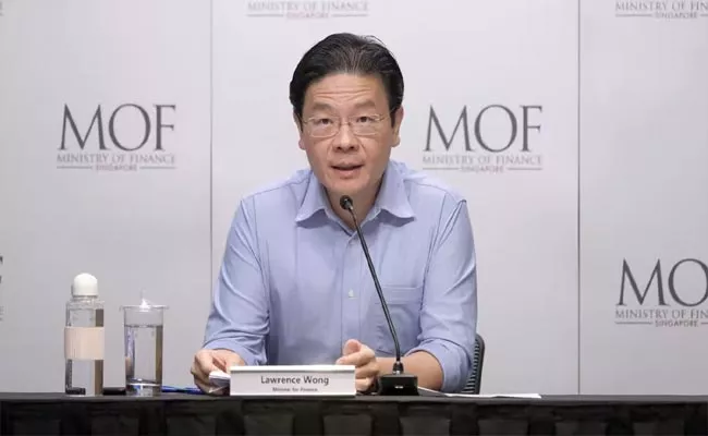 Singapore Finance Minister Lawrence Wong picked as PM - Sakshi