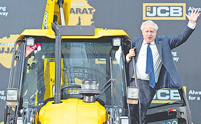 Heavy Machinery Company JCB Inaugurated Its New Plant In Gujarat - Sakshi