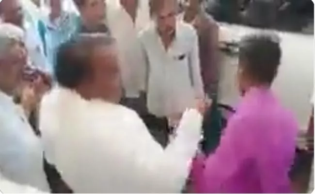 Video of Karnataka Congress MLA Slapping Youth Goes Viral - Sakshi