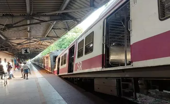 Local Train Lost Control And Climbed Over The Platform - Sakshi