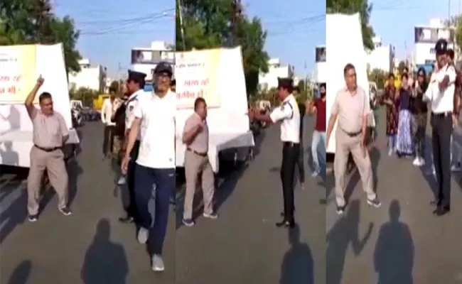 Desi Uncle And Traffic Cop Dance On Street Video Gone Viral - Sakshi