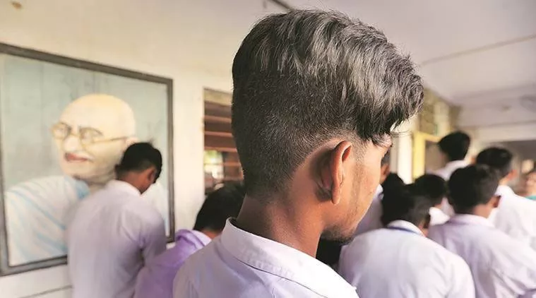 Teachers Hair Cutting To Students In Tiruvallur - Sakshi