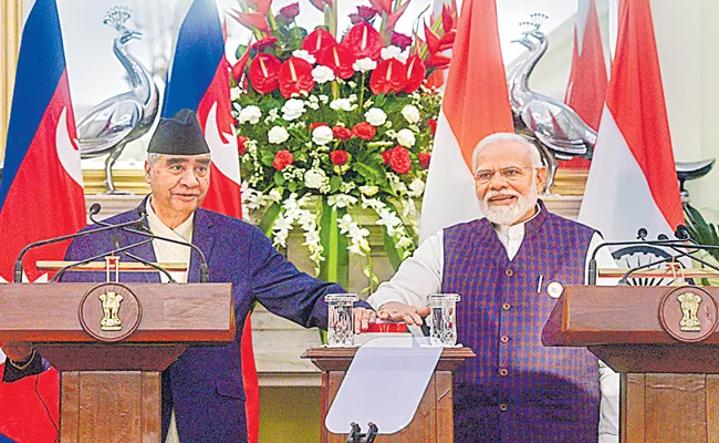 Nepal PM raises border issue with Narendra Modi - Sakshi