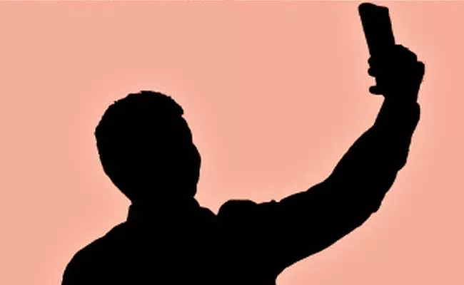 Youth Attempt Suicide Selfie Video Over Fear Of Police Mancherial - Sakshi