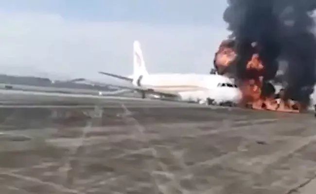 Chinese Aeroplane Aborts Take Off Catches Fire - Sakshi