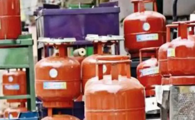 Small LPG Cylinders to be Sold Via Ration Shops - Sakshi