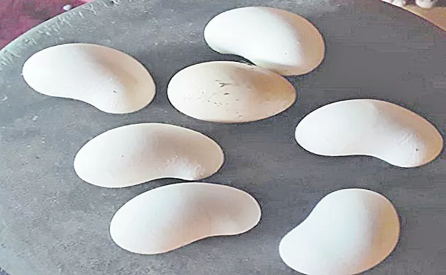 hen lays eggs in strange shapes karnataka - Sakshi