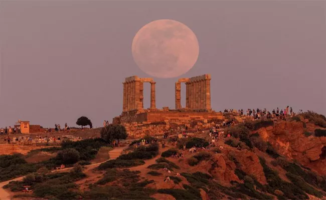 Stunning Views Of The Rare Super Flower Blood Moon Eclipse - Sakshi