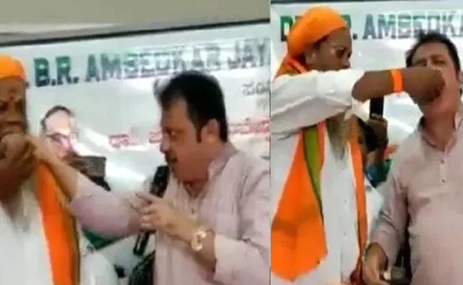 Congress MLA Zameer Eats Same Chewed food By Dalit Swamiji Viral - Sakshi