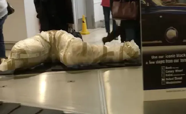 Viral Video: Is that a Body Wrapped In Paper On Conveyor Belt At Airport - Sakshi