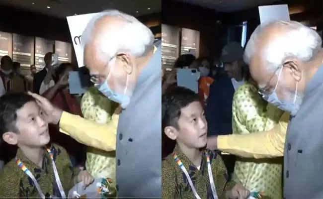 PM Amazed By Japanese Boy Hindi Greeting - Sakshi