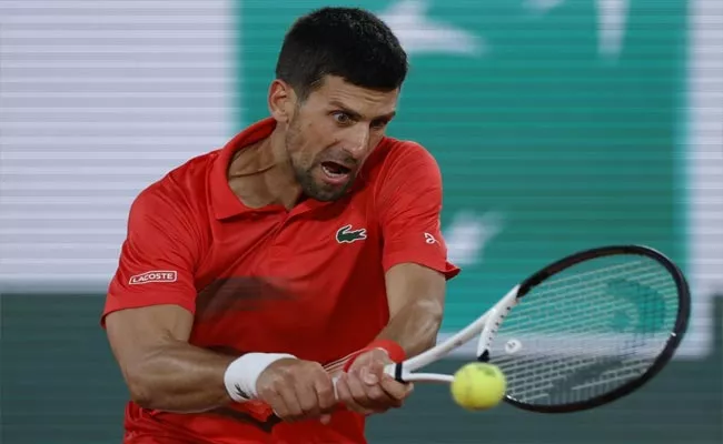 Novak Djokovic Cruises to Third Round at French Open - Sakshi