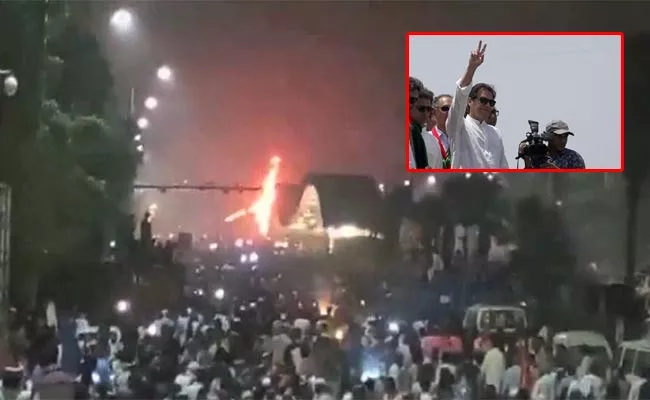 Imran Khan Supporters Set Fire To Metro Station - Sakshi