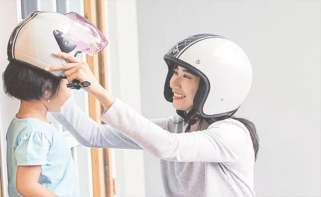 Helmets To Be Mandatory For Pillion Riders As Well In Mumbai - Sakshi